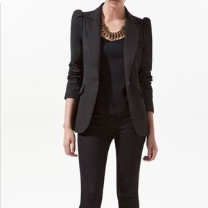 Black blazer with puffed shoulders